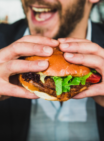 Man holding a burger