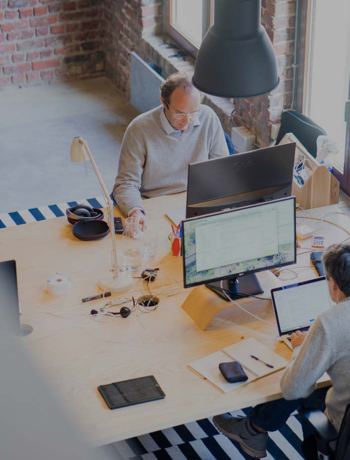 People working at their computers in an office