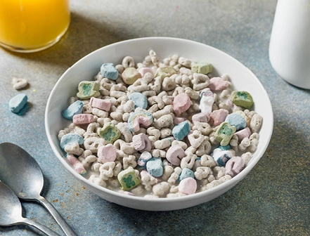 A bowl of cereal with colorless marshmallows, reflecting the shift under RFK Jr. away from synthetic dyes toward natural alternatives.